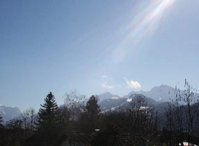Undulating Hills and Mountain Views